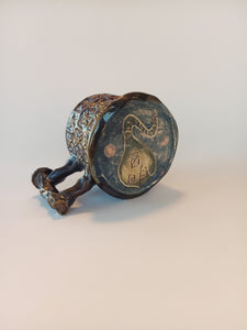Button Tipped Skull Mug