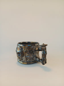 Button Tipped Skull Mug